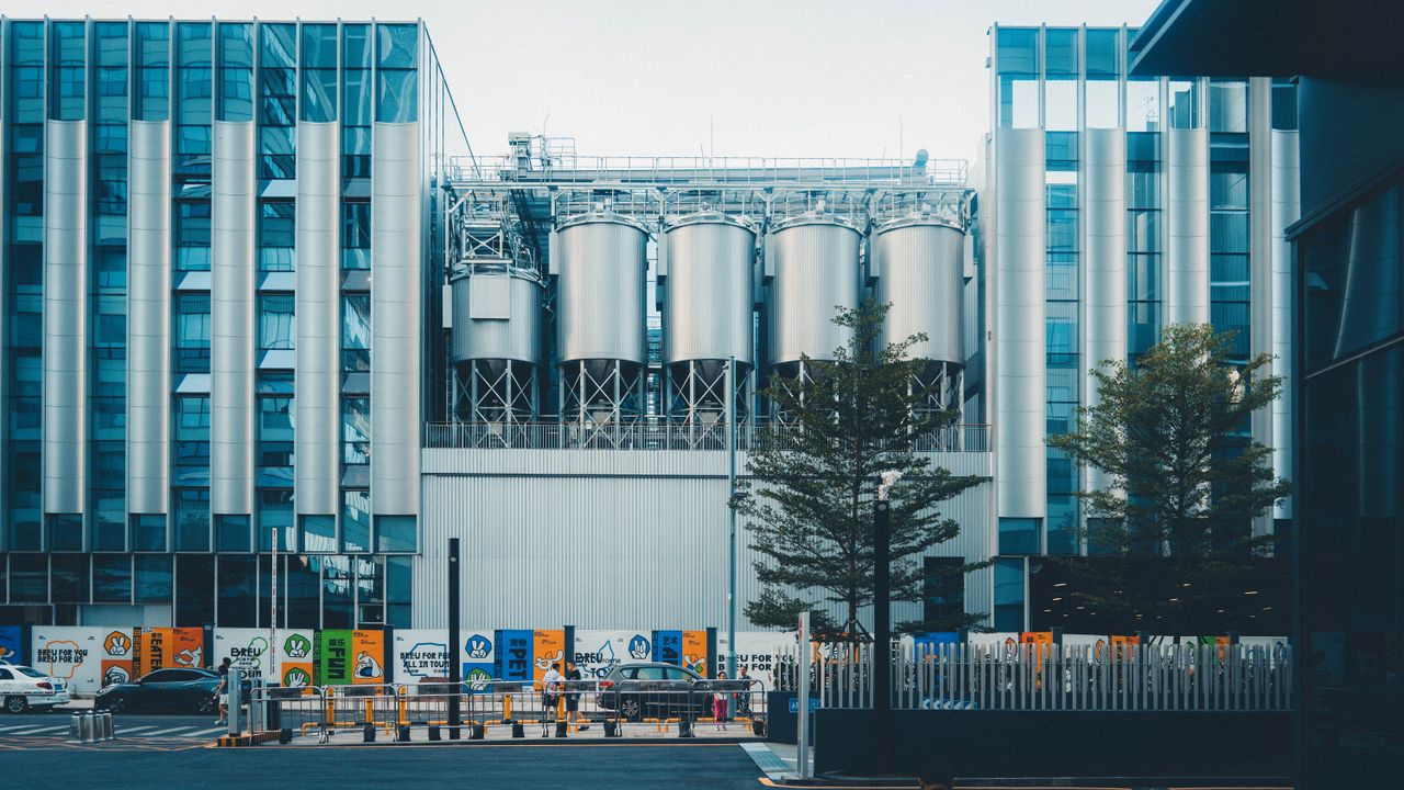 Contemporary industrial facility with sleek metal structures and modern design.